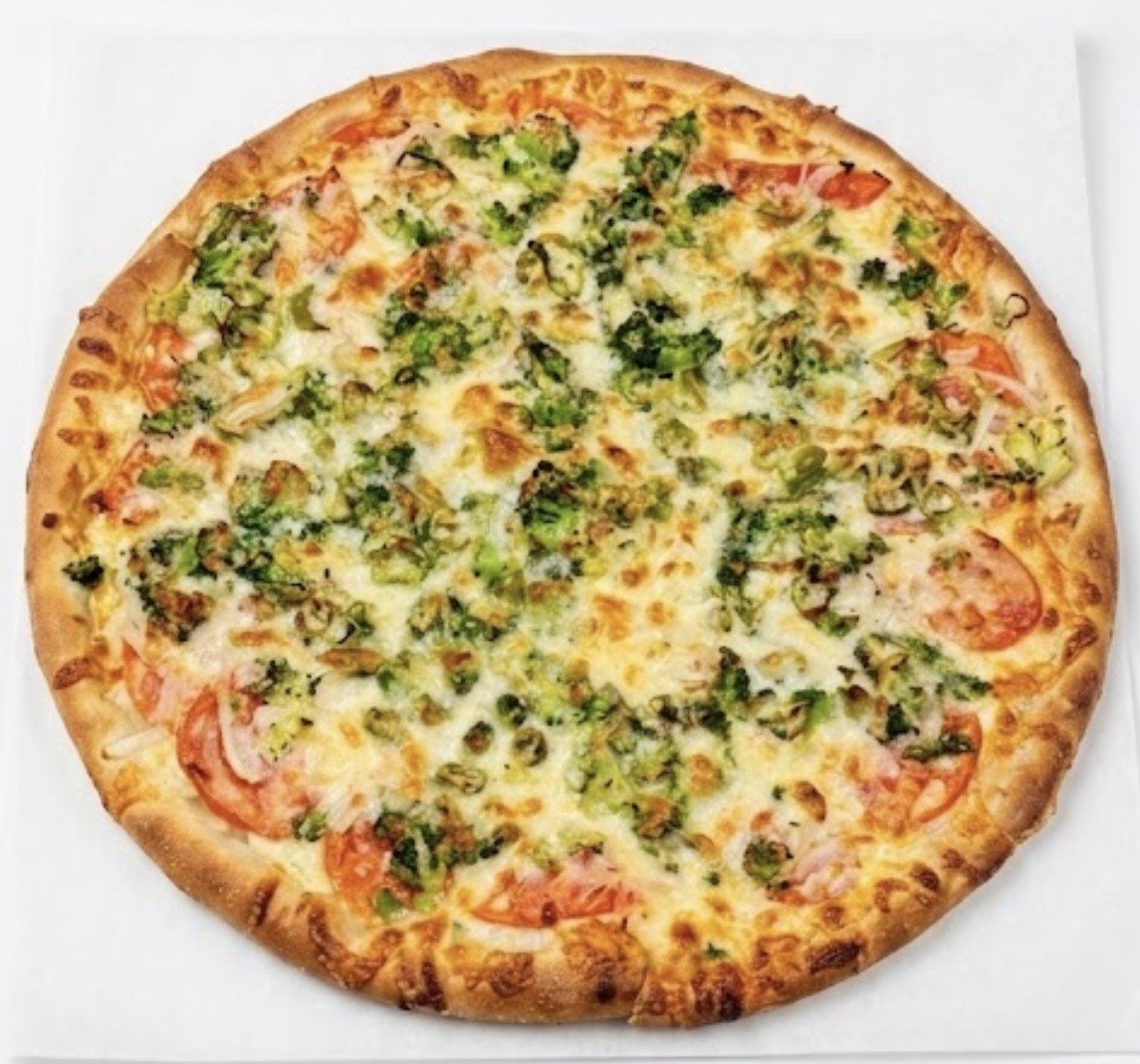 Tomato broccoli and fresh garlic pizza.