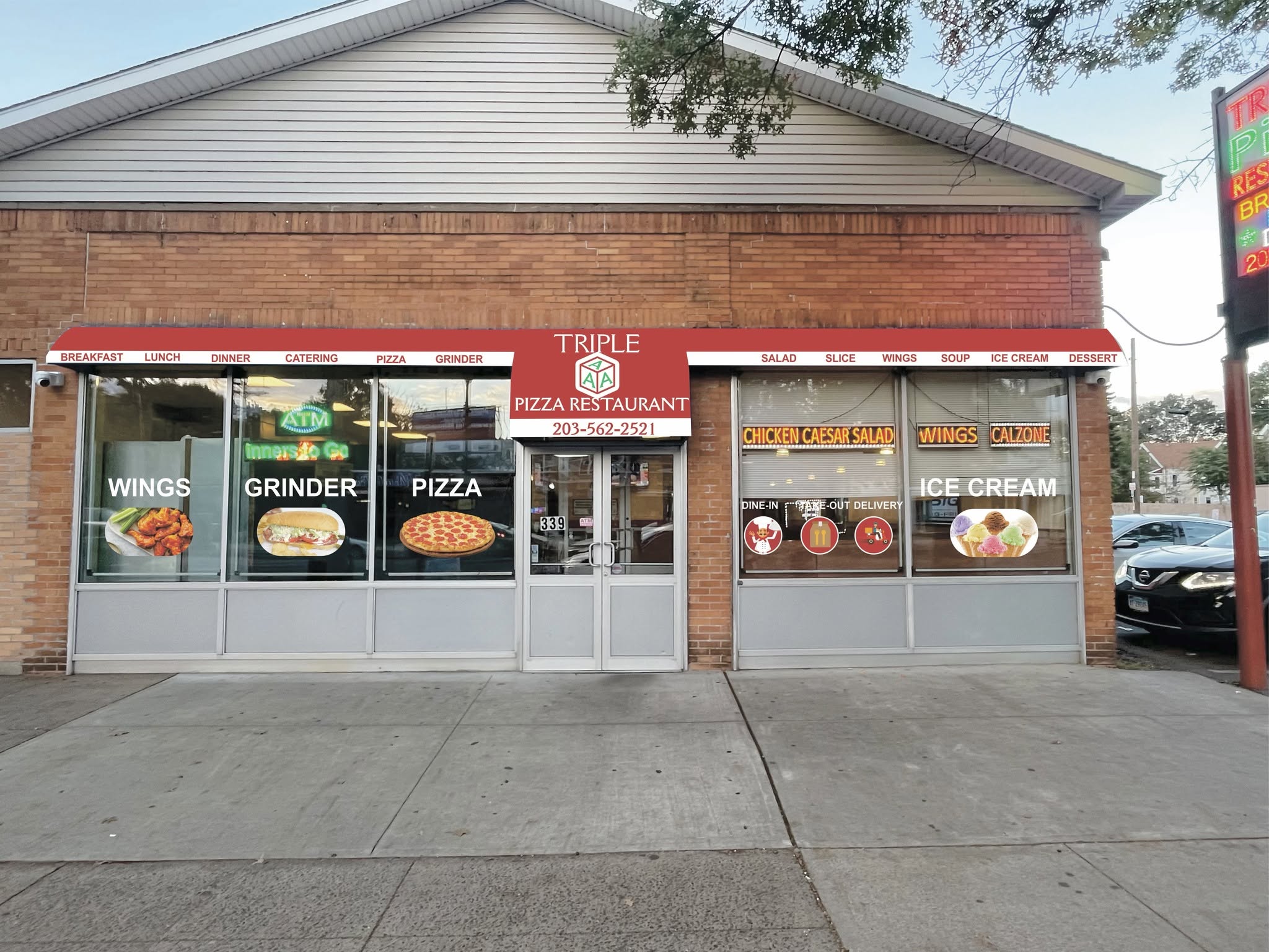Triple AAA Pizza storefront on Whalley Ave
